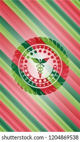 Caduceus medical icon inside christmas badge background.