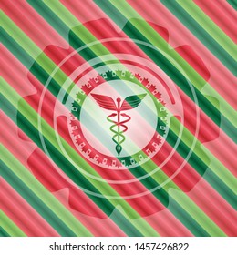 Caduceus medical icon inside christmas badge.