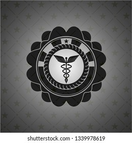 Caduceus medical icon inside dark emblem. Retro