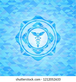  Caduceus medical icon inside light blue emblem with triangle mosaic background