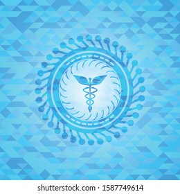 Caduceus medical icon inside light blue emblem with triangle mosaic background