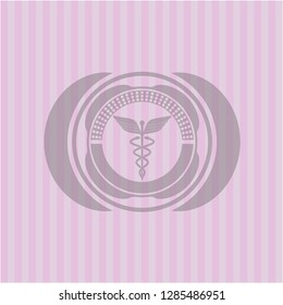 Caduceus medical icon inside realistic pink emblem