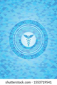 Caduceus medical icon inside realistic sky blue emblem. Mosaic background
