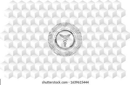 Caduceus medical icon inside realistic grey emblem with geometric cube white background
