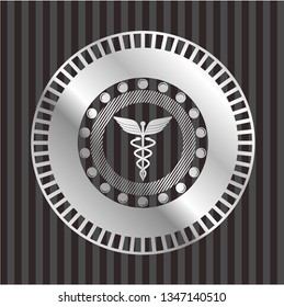 Caduceus medical icon inside silver shiny emblem