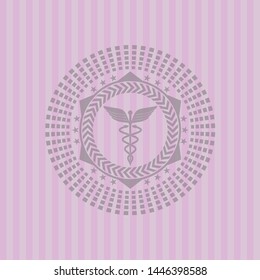 Caduceus medical icon inside vintage pink emblem