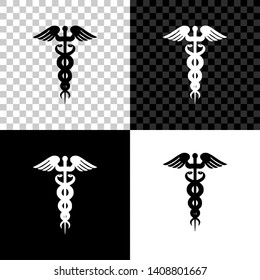 Caduceus medical symbol icon isolated on black, white and transparent background. Medicine and health care concept. Emblem for drugstore or medicine, pharmacy snake symbol. Vector Illustration