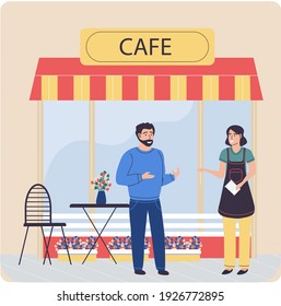 Cafe building facade. Customer man talking to female waitress in uniform makes an order for lunch. Restaurant with outdoor seating, coffee table for visitors. Street cafe, girl in an apron makes notes
