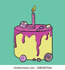 cake with candles decorated with sweets