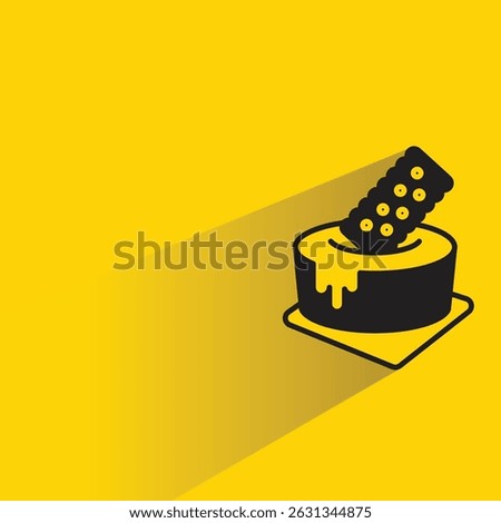 cake and kookie icon with shadow on yellow background