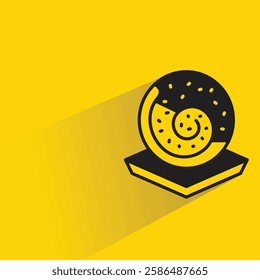 cake roll icon with drop shadow on yellow background