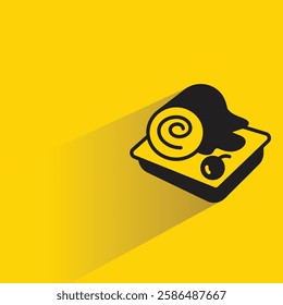 cake roll icon with drop shadow on yellow background