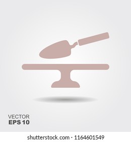 Cake stand and spatula icon. Kitchen utensils vector illustration