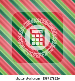 calculator icon inside christmas colors style badge.