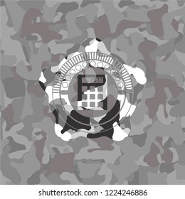 calculator icon inside grey camouflage emblem