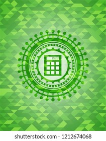 calculator icon inside realistic green mosaic emblem