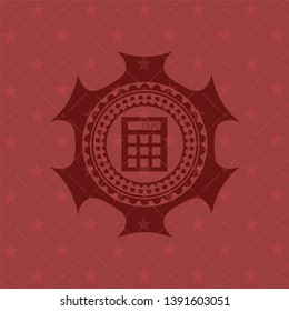 calculator icon inside red emblem
