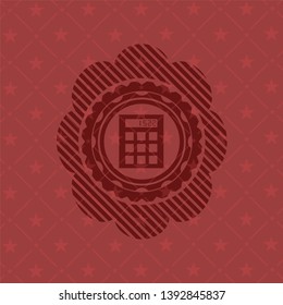 calculator icon inside red emblem