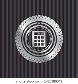 calculator icon inside silver emblem