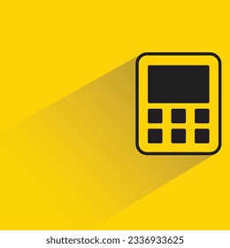 calculadora con sombra sobre fondo amarillo
