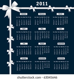 Calendar 2011 year with white bows on a dark background. Raster also available.