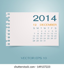 Calendar 2014 December on torn paper with copy space for your text or design. Vector illustration.