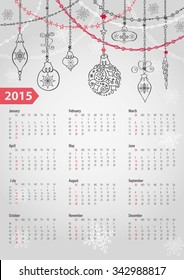 Calendar 2016 with Christmas ball and garlands.Ornate swirling decor.New year holiday Vector background.Week starts from sunday,american.Vertical