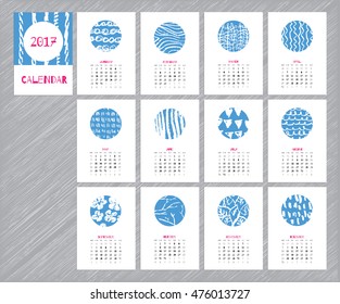 Calendar 2017 with hand drawn textures. Unique design for each month. Vector planner with geometric figures: stripes, triangles, circles, dots, flowers and leaves.