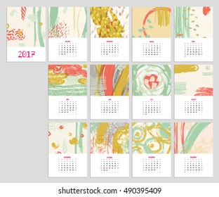 Calendar 2017 with hand drawn textures. Unique design for each month. Vector planner with geometric figures: stripes, triangles, circles, dots, flowers and leaves.