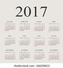 Calendar for 2017 on grey background. Vector circle calendar 2017. In this 2017 calendar week starts from Sunday and ends with Saturday. Font times family with serif regular normal