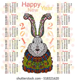 Calendar for 2017 with a picture of Christmas Zentangle rabbit in bright colorful costumes.