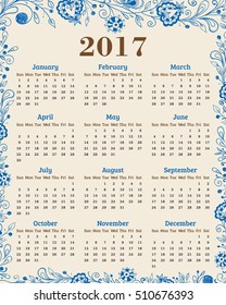 Calendar for 2017 year. Abstract floral background with blue flowers and leaves.