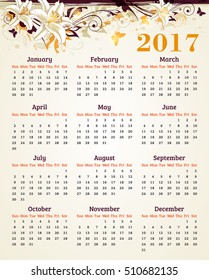 Calendar for 2017 year. Abstract floral background with lily flowers and leaves.