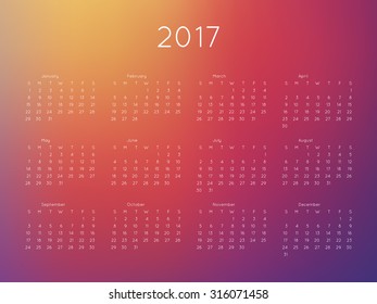 Calendar 2017 year with blurred background. Week starts from Sunday