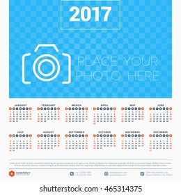 Calendar for 2017 year. Vector design stationery template. Week starts Sunday. Flat style color vector illustration. Yearly calendar template