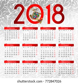 calendar 2018 with the symbol of the year, a gold dog with a bright-colored middle in the form of enamel or stained glass (background in the form of a silver frosty patterns)