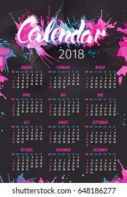 Calendar 2018 Year with handdrawn splashes. Vertical black wall calendar with pink and blue splash. Week starts Sunday
