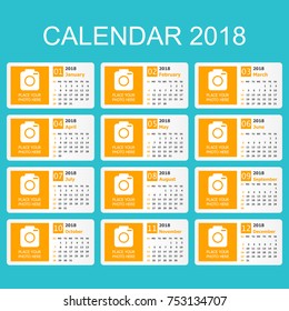 Calendar 2018 year in simple style. Calendar planner design template with place for photo. Week starts on sunday. Business vector illustration.