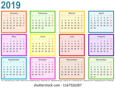 Calendar 2019, each month in a differently colored square and markings of public holidays for the USA in a landscape format