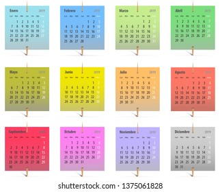 Calendar for 2019 in Spanish on colorful stickers attached with toothpicks. Vector illustration