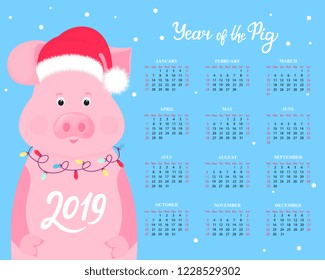 Calendar for 2019 from Sunday to Saturday. Cute pig in a hat of Santa Claus with a garland. Chinese New Year.