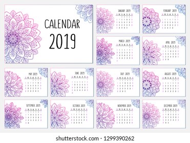 Calendar for 2019 year with decorative hand drawn mandala elements. Round ornament pattern for holiday event planner. Weeks starts on Sunday. Peaceful mandala calendar with love.