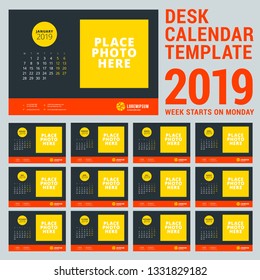 Calendar for 2019 year. Desk calendar design template with place for photo. Week starts on Monday. Vector illustration