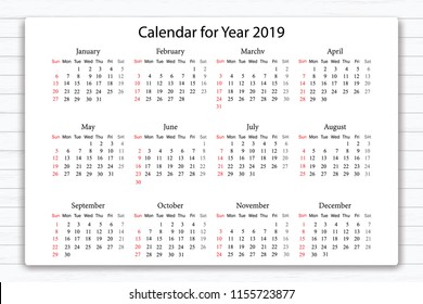 Calendar 2019 year in simple style on white wooden texture background. Week starts from Sunday. Vector illustration.