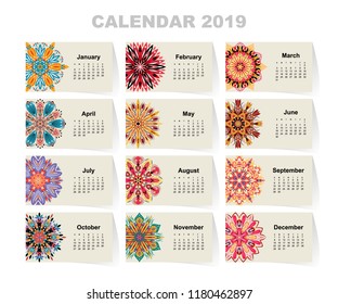 Calendar for 2019 year. Vintage decorative mandala elements. Week starts on sunday. Vintage style template for your design.