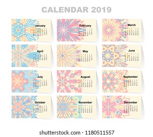 Calendar for 2019 year. Vintage decorative mandala elements. Week starts on sunday. Vintage style template for your design.