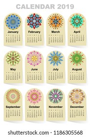 Calendar for 2019 year. Vintage decorative mandala elements. Week starts on sunday. Vintage style template for your design