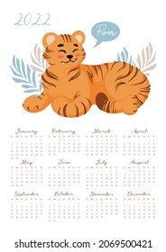 Calendar for 2022 Cute lying tiger growls roar, vector illustration in cartoon style. For For children, study, work. International Tiger Day. Symbol Chinese New Year 2022 format A4, A3. Vertical