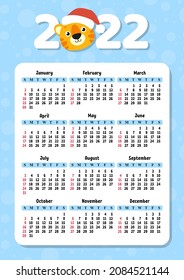 Calendar for 2022 with a cute tiger symbol of the new year. Fun and bright design. Isolated color vector illustration. cartoon style.
