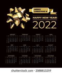 Calendar for 2022 with a gold bow. Vector illustration on black background